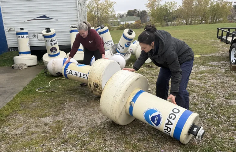 Marine sanctuary staff removes mooring buoys for the season